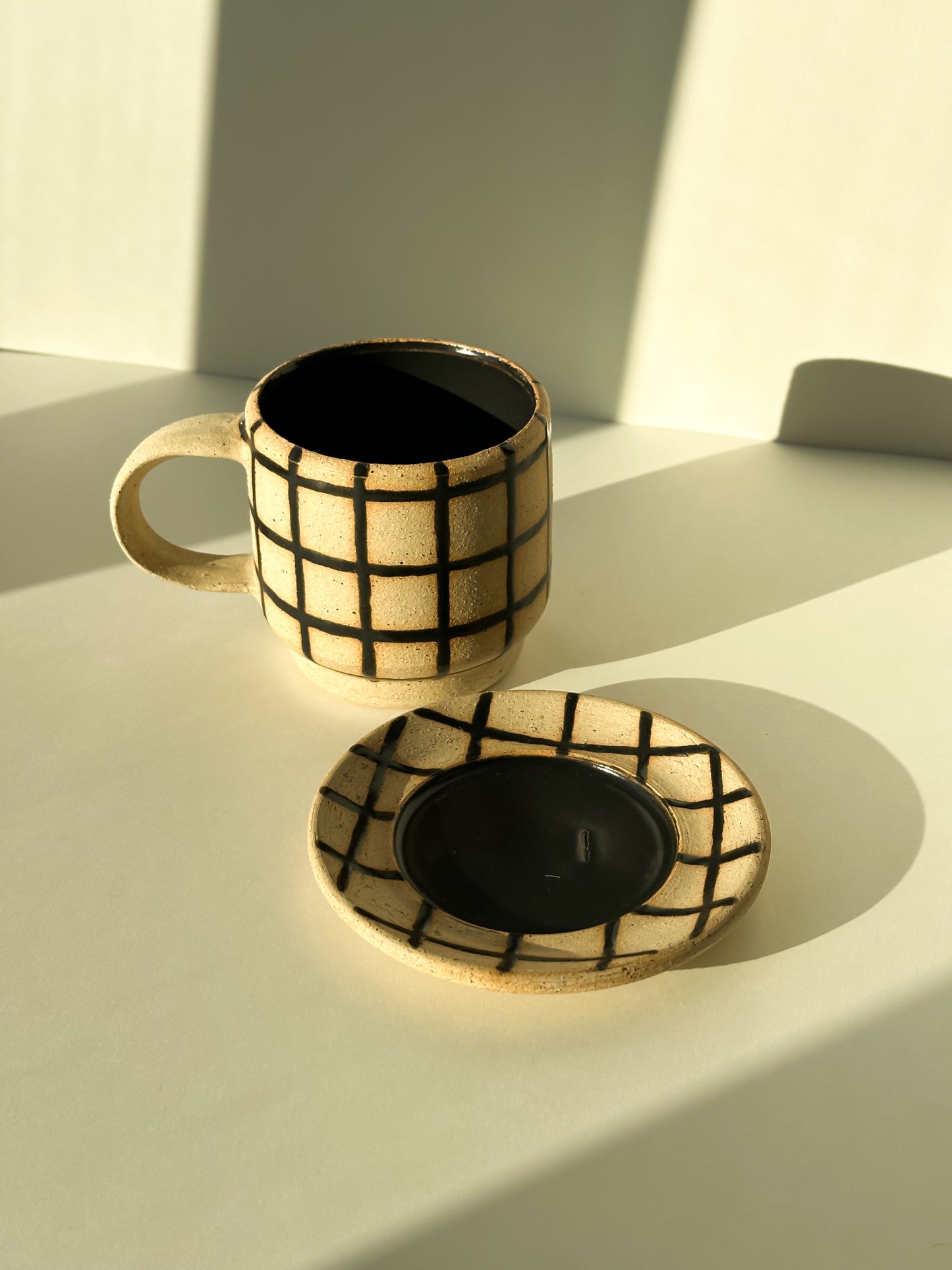 Gridded Cup and Saucer