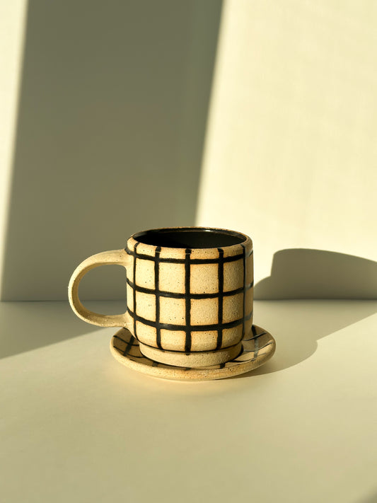 Gridded Cup and Saucer